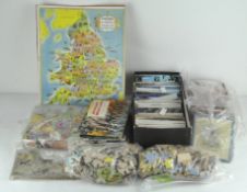 Assorted collectables, including postcards, cigarette cards,