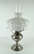 A vintage Aladdin model 12 oil lamp with an unusually large shade,