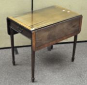 A 19th century mahogany Pembroke table, glass topped,