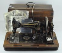 A Frister and Rossman sewing machine, no 1421807,