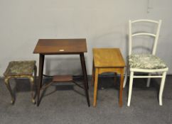 A group of three tables, max 70cm x 53cm x 35cm, and a white painted chair,