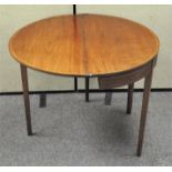 A late 19th/early 20th century mahogany demi-lune table with inlaid decoration,