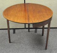 A late 19th/early 20th century mahogany demi-lune table with inlaid decoration,