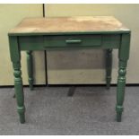 A modern green painted table unit, with single draw to front, turned supports,