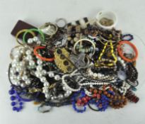 A large assortment of costume jewellery, including necklaces,