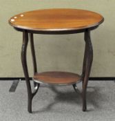 A late 19th.early 20th century mahogany oval occasional table
