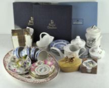 A collection of ceramics including part teasets and Wedgwood wall plates