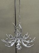 A silver painted antler style chandelier.