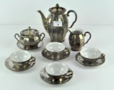 An Art Deco silver on porcelain part coffee set