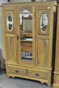 A Pine single door wardrobe, with three mirrors to front, above two drawers,
