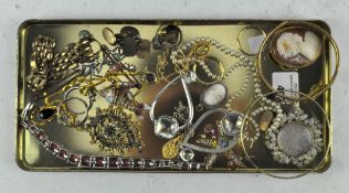 A small selection of costume jewellery, including cameo brooch,