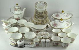 An extensive collection of Royal Doulton "Canton" pattern dinner and tea services,