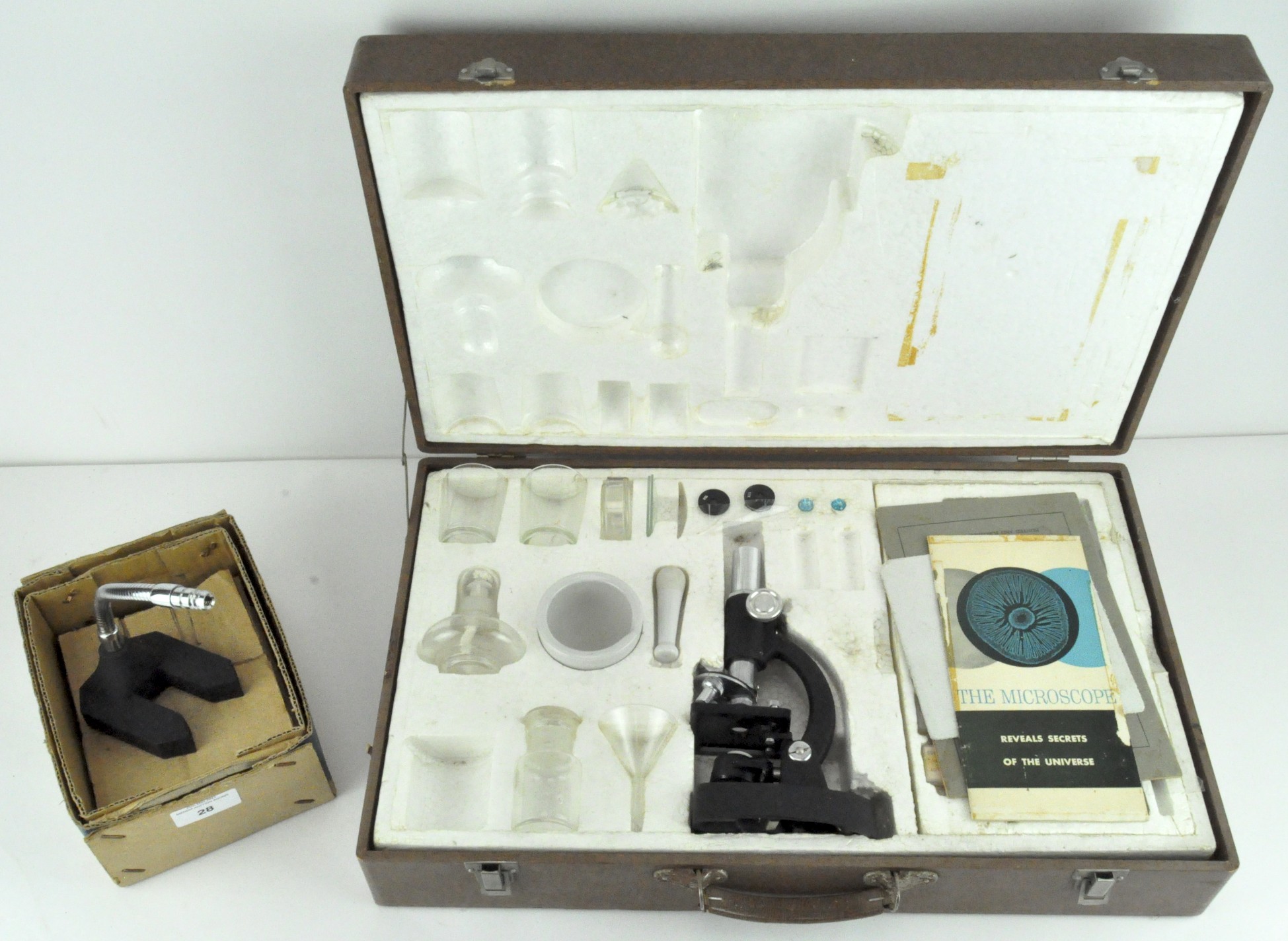 A cased microscope / science kit,,