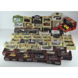 A collection of boxed Lledo "Days Gone" and Matchbox "Models of Yesteryear" model vehicles.