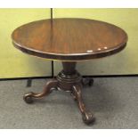 A Victorian mahogany tilt top dining table of circular form,