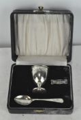 A silver Christening set, comprising egg cup and spoon, hallmarked Sheffield 1952, in original case,