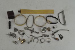 A collection of silver jewellery and other items,
