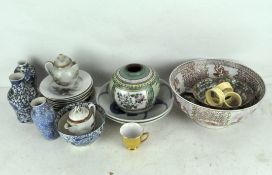 A collection of Asian ceramics, including: a Canton bowl, two blue and white carp dishes,
