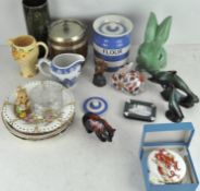A collection of ceramics, including: a Cornish Ware Flour jar and cover, a Wade Art Deco jug,
