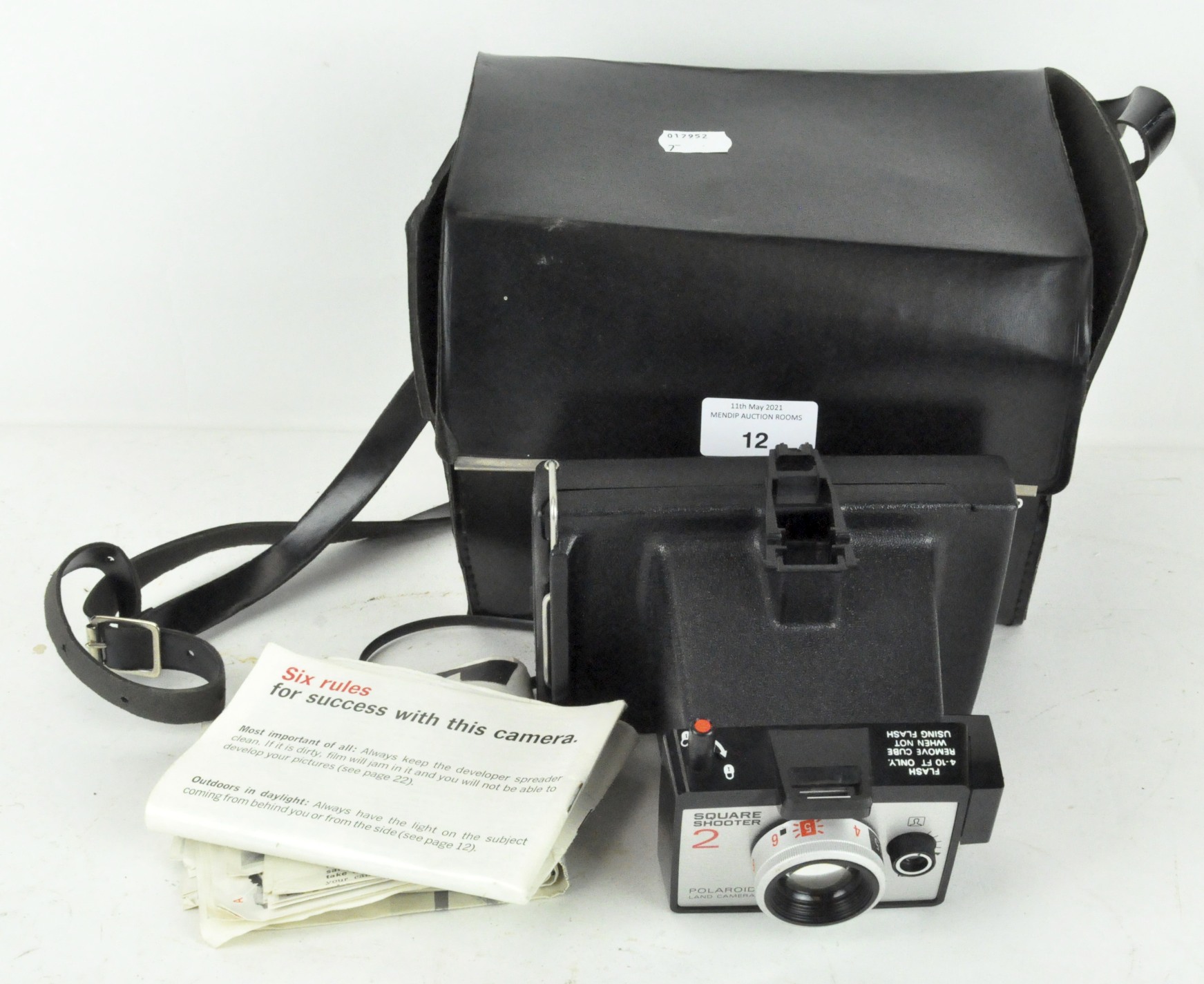 A Polaroid Square Shooter 2 Land camera,