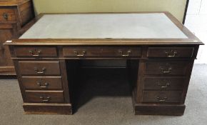 A Georgian style mahogany kneehole desk, 20th century,