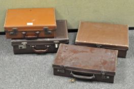 A group of vintage briefcases