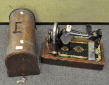 A vintage Singer sewing machine, F1443204,