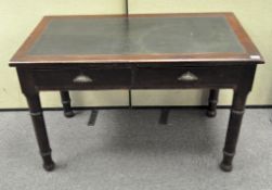 A Victorian mahogany writing desk, the two drawers with shell handles,