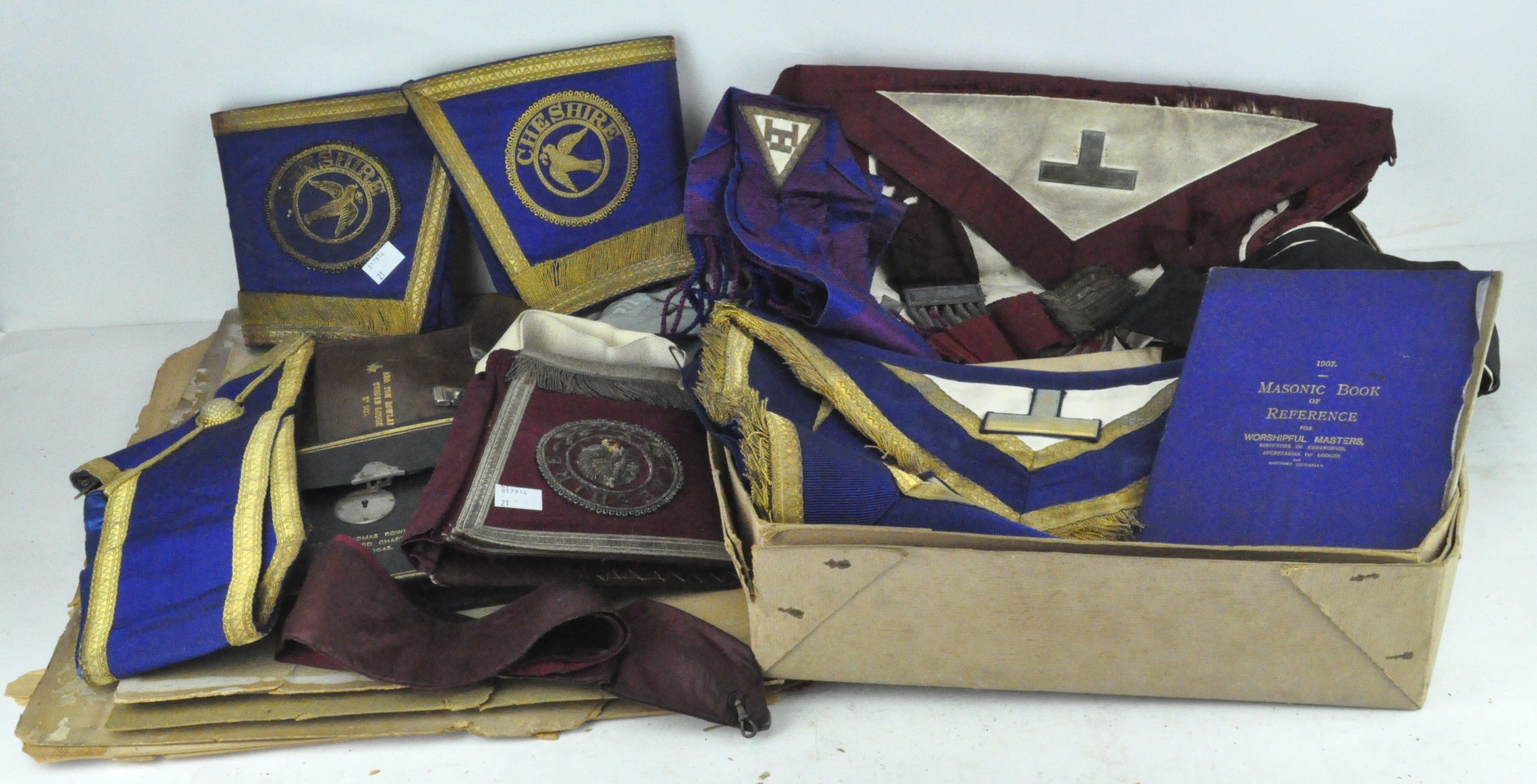 A collection of Masonic items, including apron,