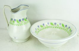 A George Jones ceramic wash basin and pouring jug