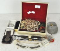 A collection of vintage costume jewellery, including watches,