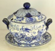 A large late 19th century blue and white serving bowl, a similar dish,