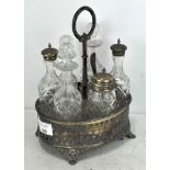 A silver plated six piece cruet set stand with six glass bottles,