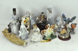 A collection of assorted ceramic figures and others,