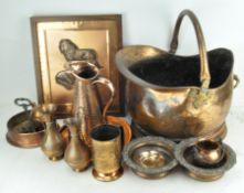 A collection of assorted copper and brassware, to include a coal scuttle, hammered pouring jug,