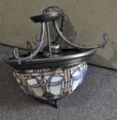 A Tiffany style ceiling light, with simulated stained and leaded glass panels,