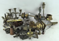 A collection of assorted brass and copper ware, including cannon on wooden stand, set of bellows,