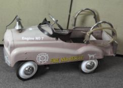 A vintage fire and rescue child's pedal car fire engine,