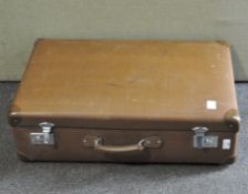 A Globe Trotter suitcase, mid 20th century, brown hard case,