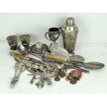 A collection of silver plated wares, to include a vintage cocktail shaker, small trophy on stand,