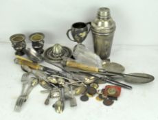 A collection of silver plated wares, to include a vintage cocktail shaker, small trophy on stand,