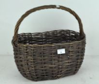 A single handled wicker basket,