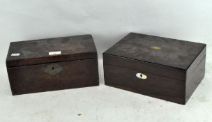 Two wooden boxes, one rosewood with mother of pearl inlay, the other mahogany,