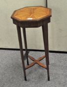 An inlaid mahogany occasional table of octagonal form,