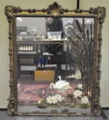 A painted mirror, in gilt frame,