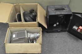 Two vintage projectors, one being a Hi-Lyte slide and film projector in original box,