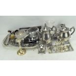 An extensive collection of silver plated wares, together with a mouth organ,