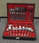 A vintage canteen of Oneida cutlery, comprising forks, spoons,