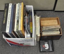 A collection of assorted vinyl records and CD's