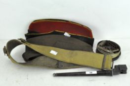 A collection of military items, to include a spike bayonet